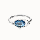 Bangle bracelet with faceted blue crystal